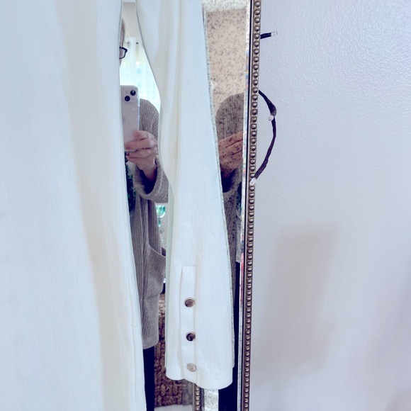 Size M fits more like a small, long, fitted cream color with gold metal snaps - Picture 4 of 15